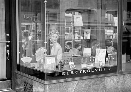 A beauty store advertising electrolysis hair removal, circa 1938