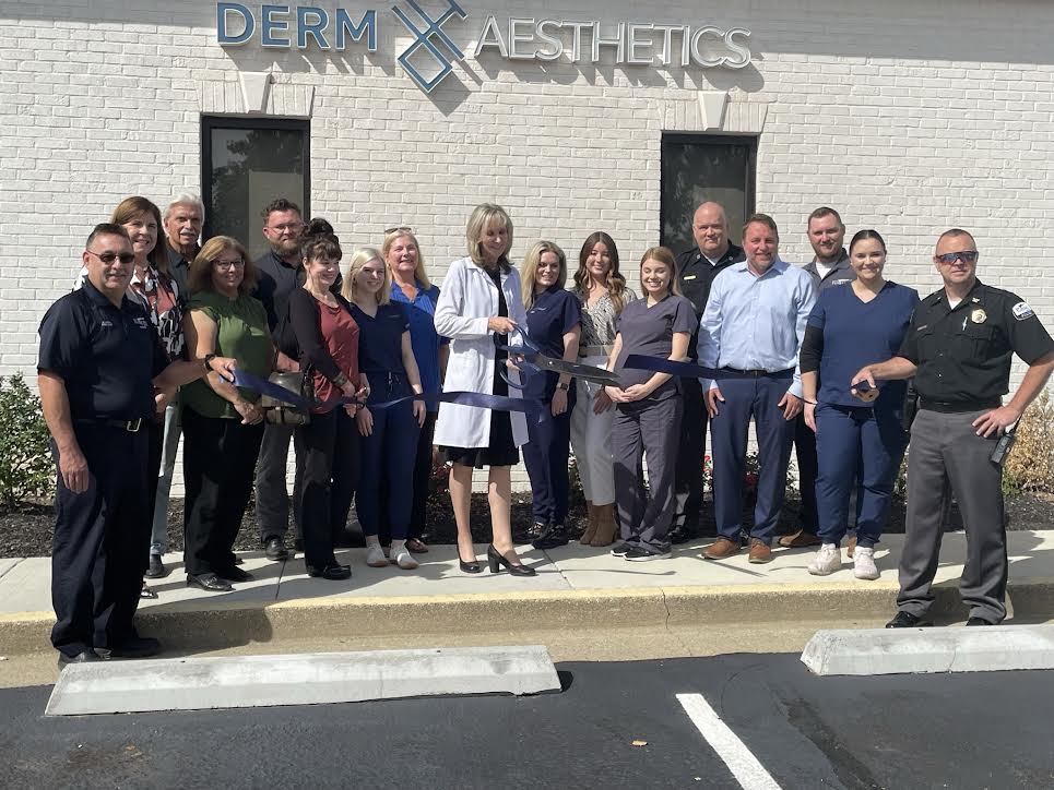 Dr. Susan Bushelman cuts the ribbon on Derm Aesthetics. (Photo by Patricia Scheyer/NKyTribune)