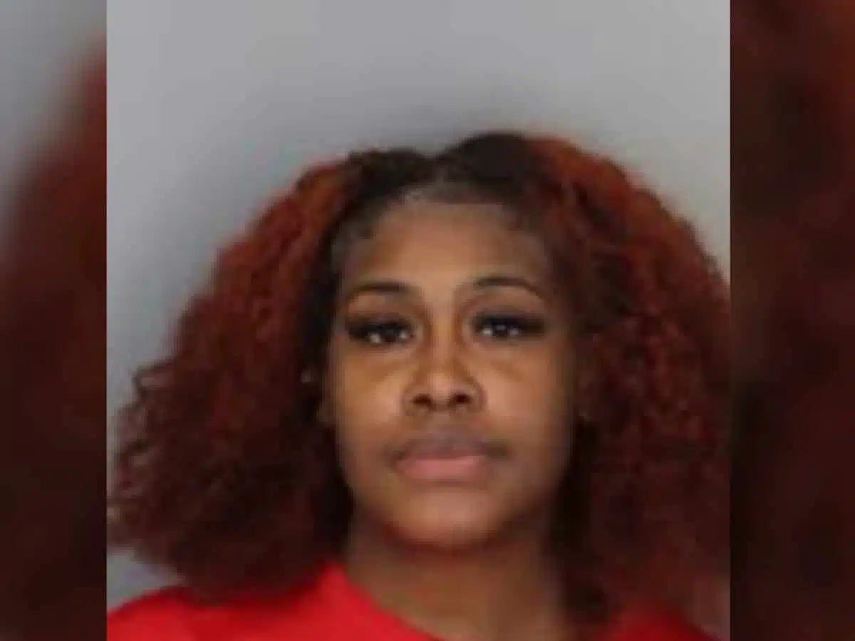 Jasmine Moss, 30, allegedly shared photos of her 5-year-old daughter waxing nude women -- Photo Credit: Shelby County Jail