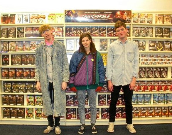 Emily (middle) during her stint with Total Slacker.