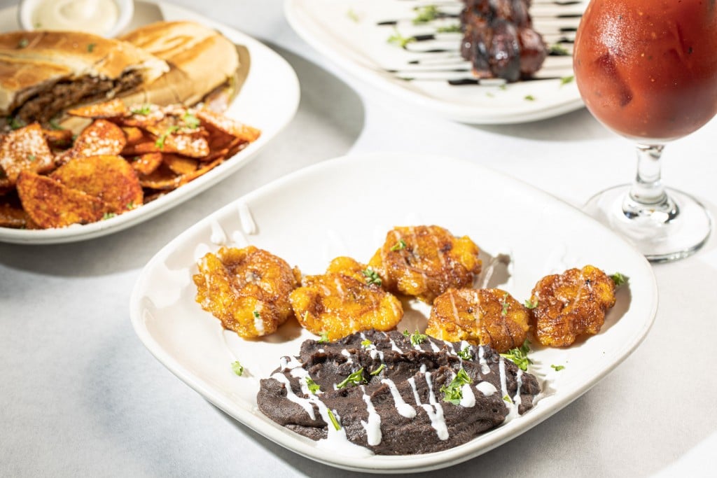 Crisp plantains flank a creamy black bean purée. // Photo by Zach Bauman