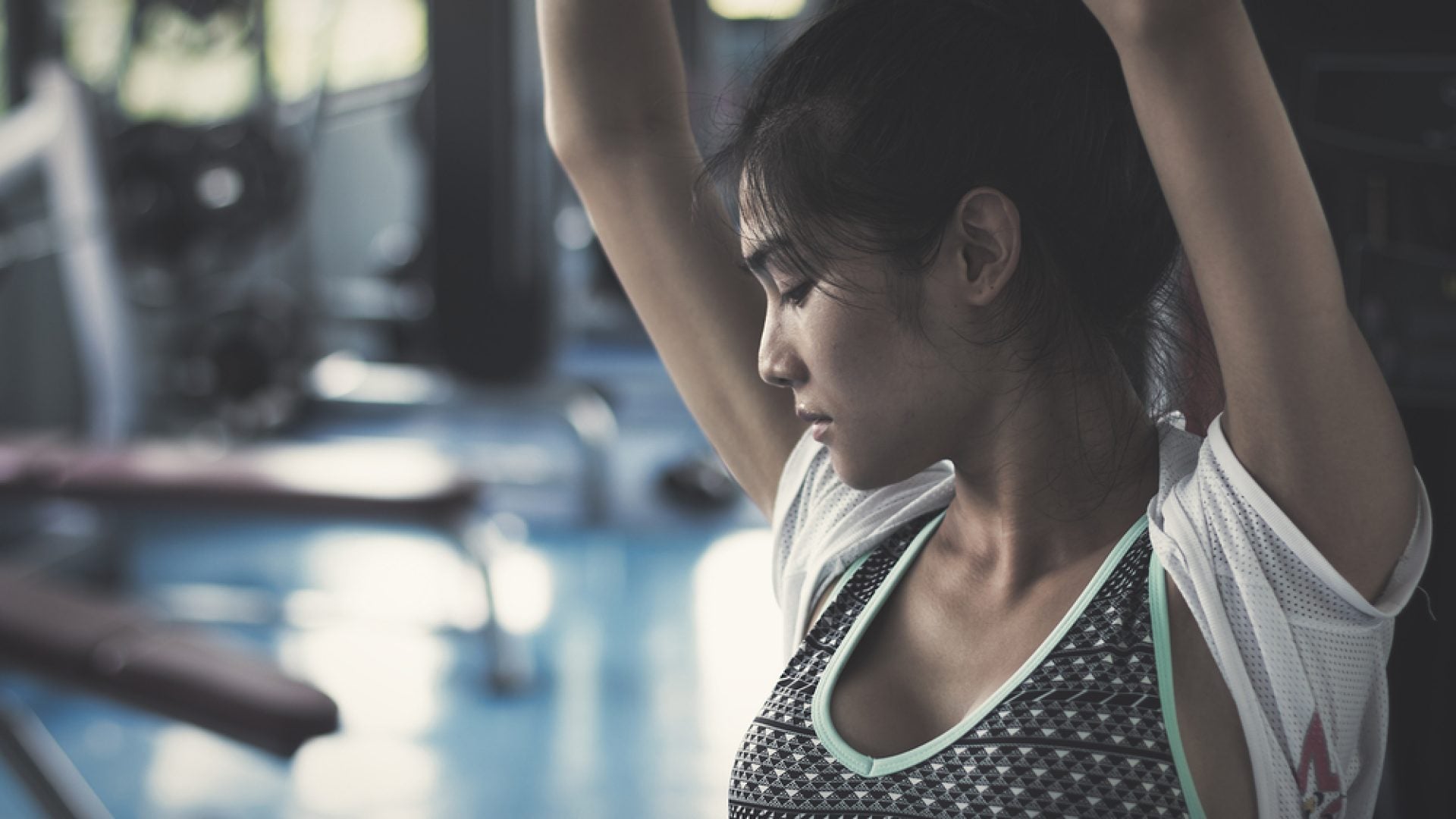 Woman sweating at the gym