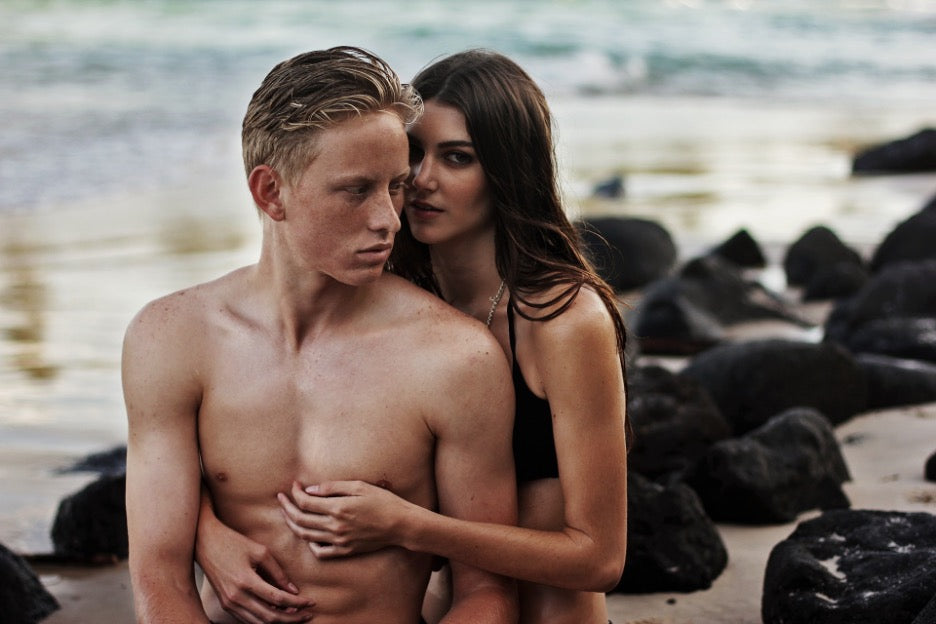 man and woman on beach