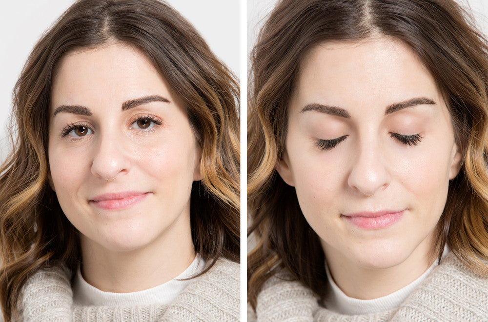 woman showing eyelash extensions